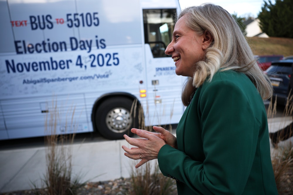 Virginia Democratic gubernatorial candidate Abigail Spanberger standing near her campaign’s bus