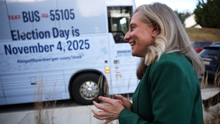 Virginia Democratic gubernatorial candidate Abigail Spanberger standing near her campaign’s bus