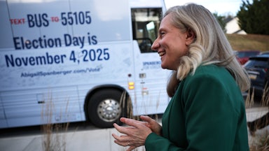 Virginia Democratic gubernatorial candidate Abigail Spanberger standing near her campaign’s bus
