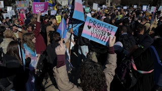 People protest in support of transgender kids outside the Supreme Court in Washington, D.C.