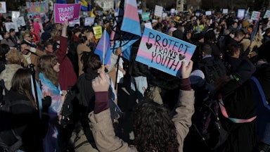 People protest in support of transgender kids outside the Supreme Court in Washington, D.C.