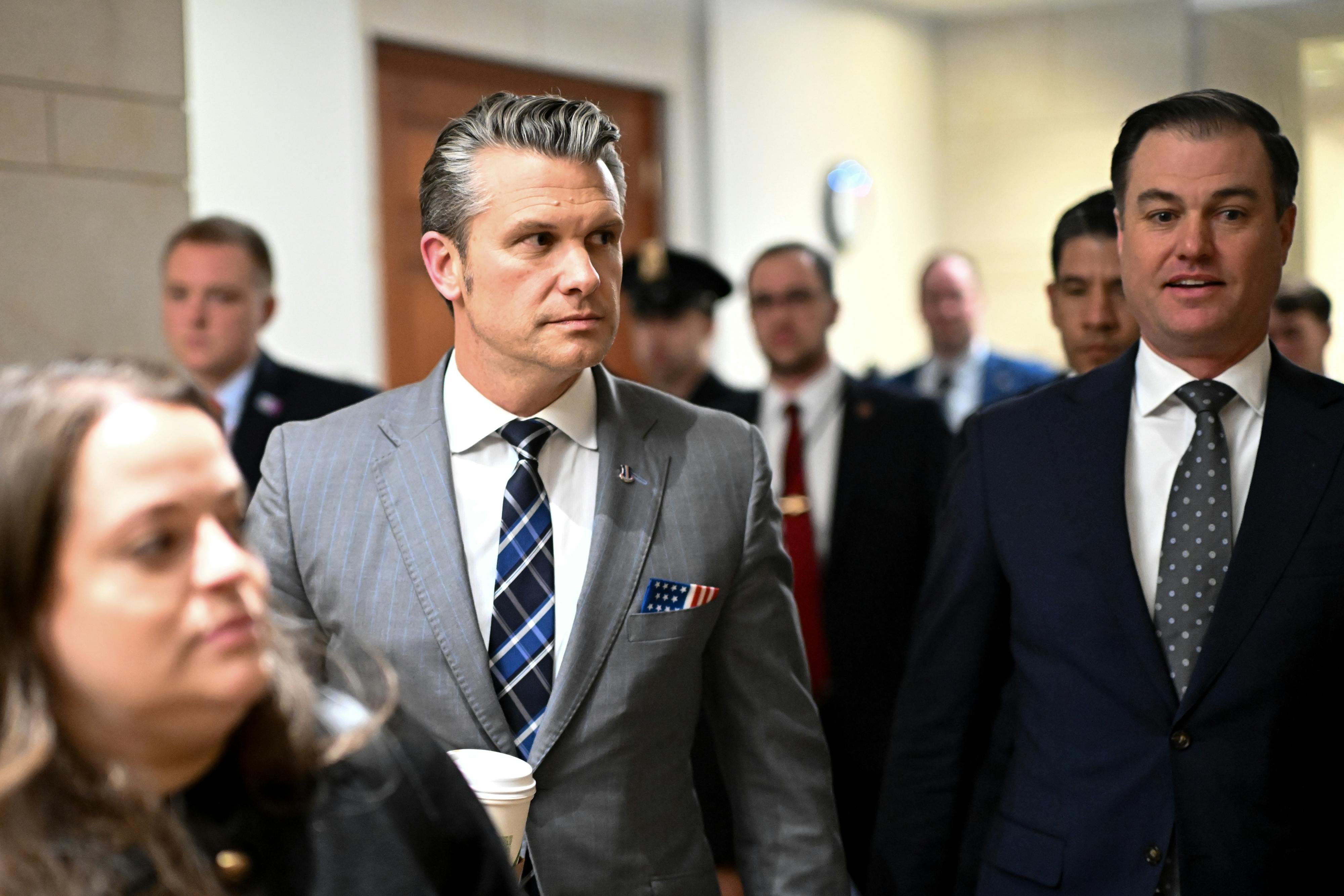 Defense Secretary Pete Hegseth walks in the Capitol