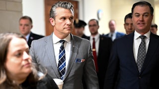 Defense Secretary Pete Hegseth walks in the Capitol