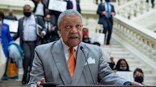 Fulton County Board of Commissioners Chairman Robb Pitts speaks at a lectern.