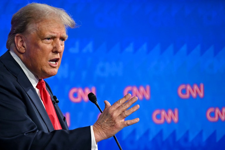 Donald Trump gestures as he speaks