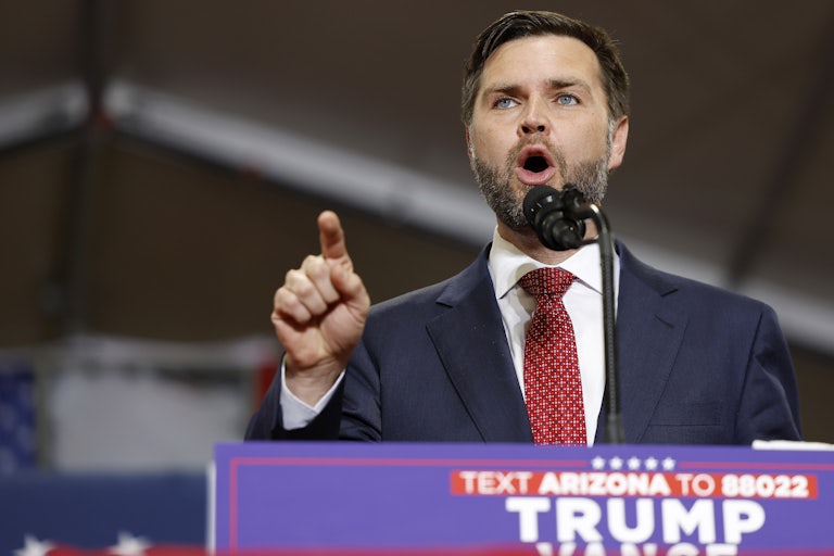J.D. Vance gestures as he speaks at a Donald Trump rally