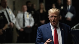 Donald Trump gestures as he speaks