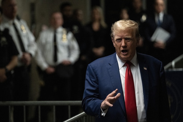 Donald Trump gestures as he speaks