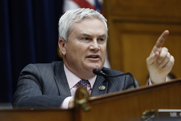 James Comer gestures as he speaks into a microphone