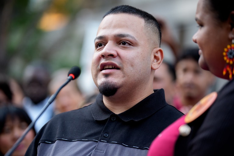 Kilmar Abrego Garcia speaks into a microphone