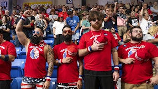 Nick Passano, left, a Millennial cryptocurrency investor, pumps his fist in the air during a political rally where Donald Trump spoke during a campaign stop in Johnstown, Pennsylvania on August 30, 2024,