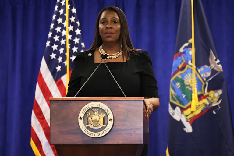 Letitia James stands at a podium