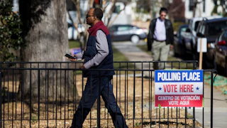 A man walks to a polling place to cast his vote.