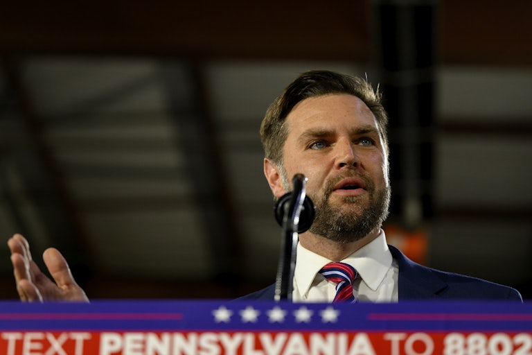 J.D. Vance gestures while speaking at a Donald Trump campaign event