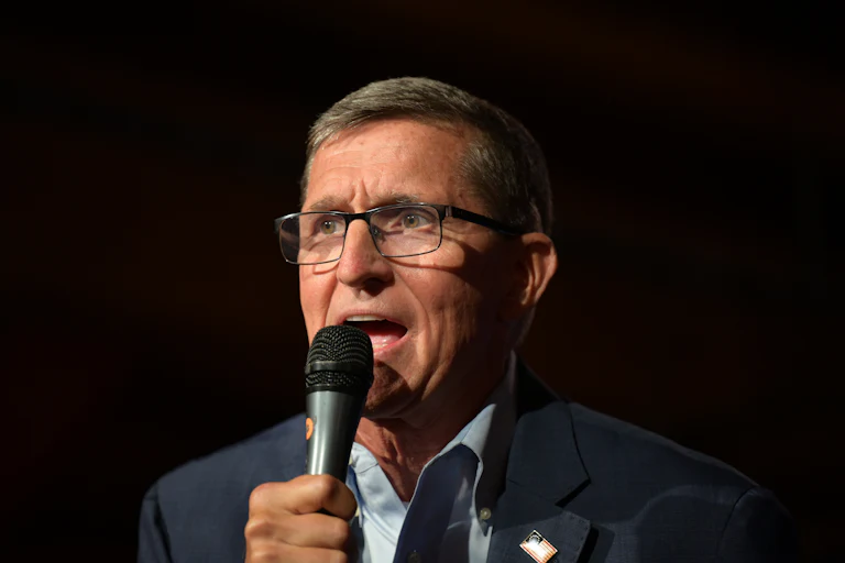 Michael Flynn speaks into a microphone