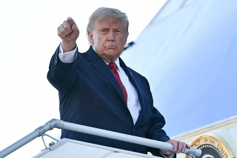 Donald Trump boards Air Force One