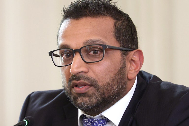 FBI Head Kash Patel speaks in a meeting.