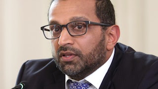 FBI Head Kash Patel speaks in a meeting.