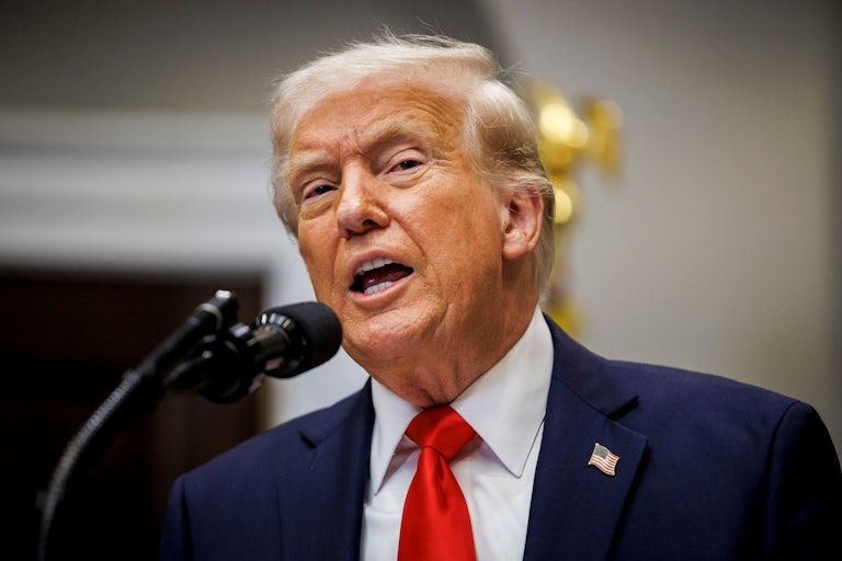 Donald Trump speaks at a mic