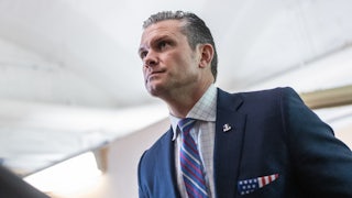 Defense Secretary Pete Hegseth walks in the Capitol