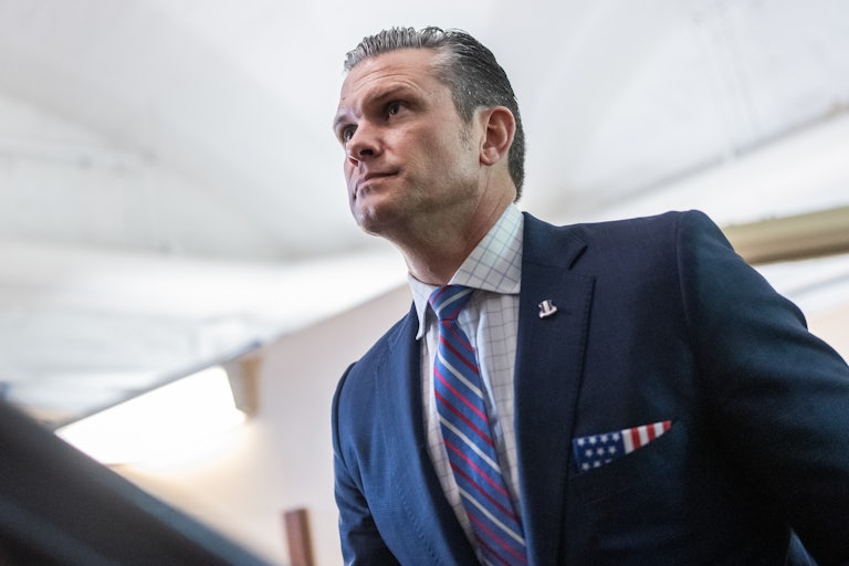 Defense Secretary Pete Hegseth walks in the Capitol