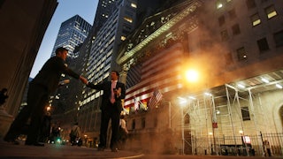 Workers outside the New York Stock Exchange