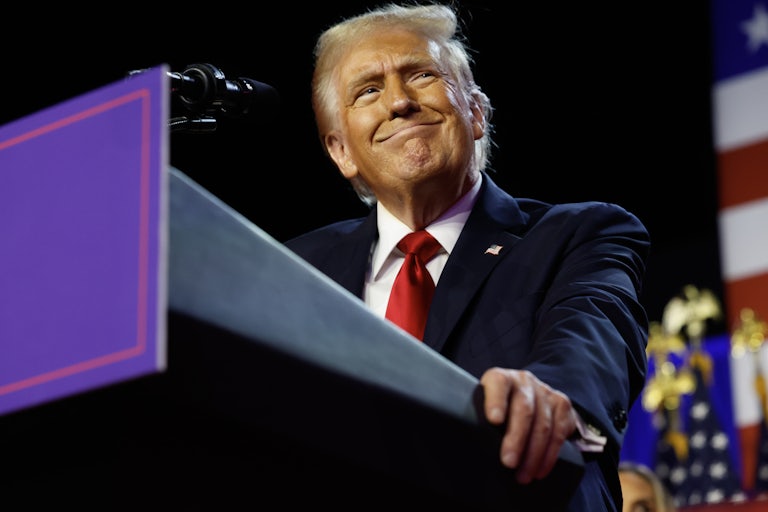 Donald Trump arrives to speak during an election night event at the Palm Beach Convention Center.