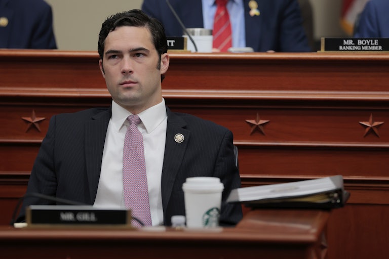 Representative Brandon Gill sits in a congressional hearing.