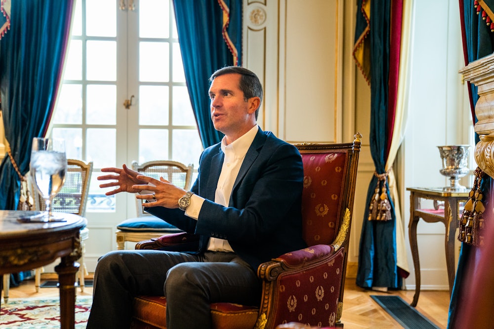 Kentucky Governor Andy Beshear speaks with a reporter during an interview at the Governors Mansion in Frankfort, Kentucky.