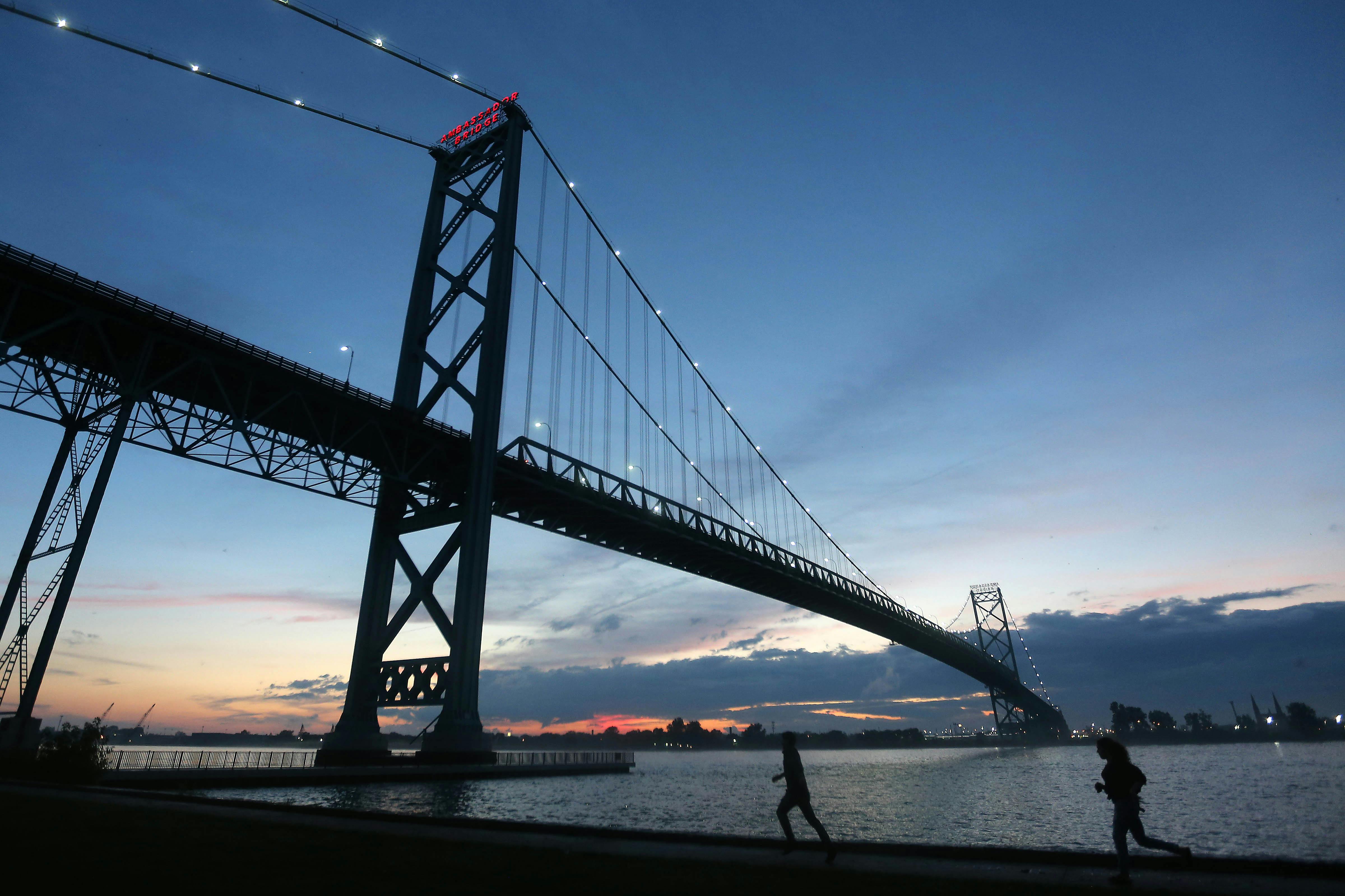 The existing Ambassador Bridge connecting Michigan to Ontario. The new Windsor to Detroit Bridge, named the Gordie Howe Bridge will be built down river from the Ambassador Bridge. 