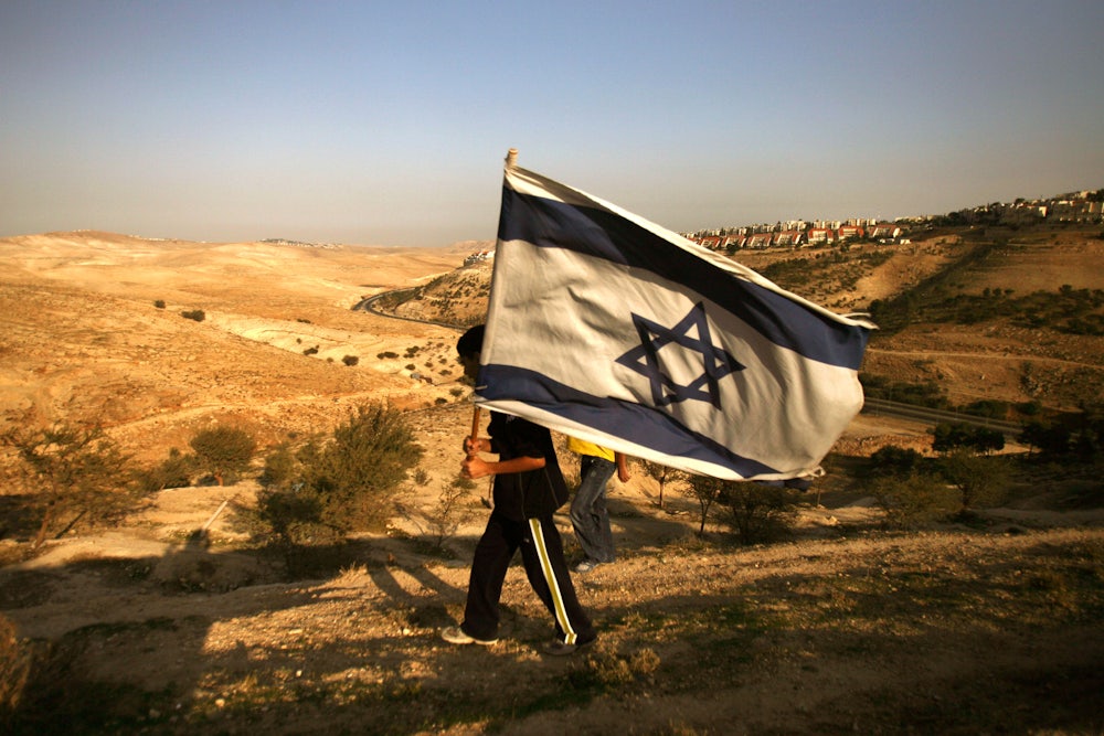 An Israeli settler at a new settlement area in the West Bank