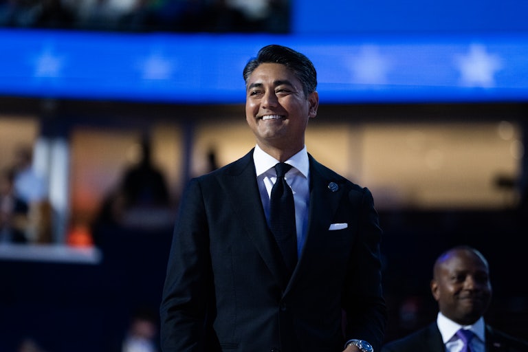 Cincinnati Mayor Aftab Pureval smiles and walks at the DNC