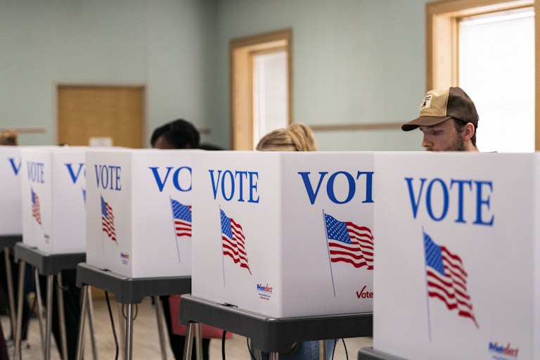 Voters cast their ballots at the polls for the election
