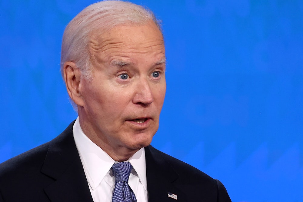 Joe Biden speaks in front of a blue background at Thursday's presidential debate.