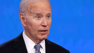 Joe Biden speaks in front of a blue background at Thursday's presidential debate.