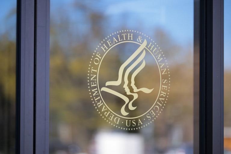A window displays the Health and Human Services Department logo