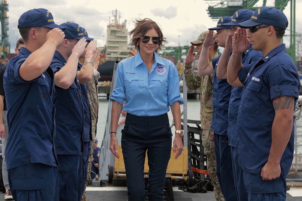 Kristi Noem, wearing her infamous watch, boards the U.S. Coast Guard Cutter Escanaba