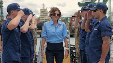 Kristi Noem, wearing her infamous watch, boards the U.S. Coast Guard Cutter Escanaba