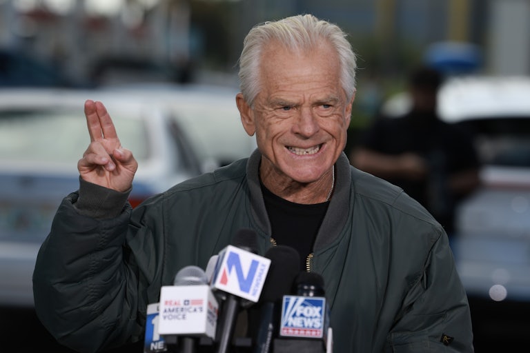 Trump lawyer Peter Navarro holds a press conference outside of federal prison, before turning himself in