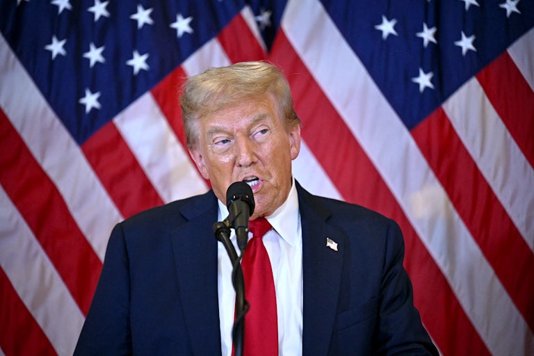 Donald Trump speaks at a mic