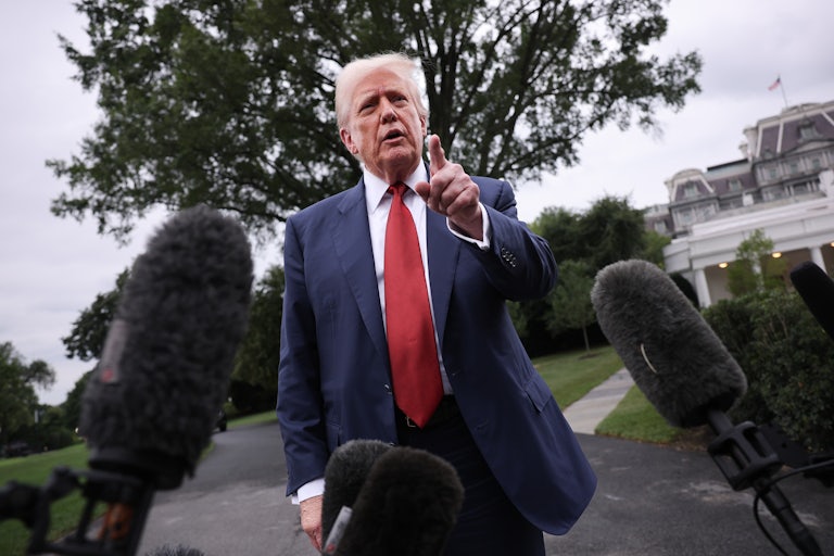 Donald Trump speaks to reporters