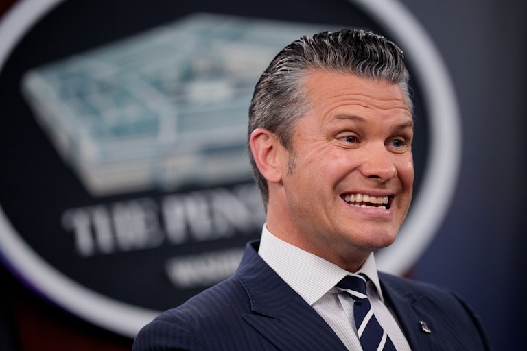 Pete Hegseth makes a weird face while speaking during a press conference