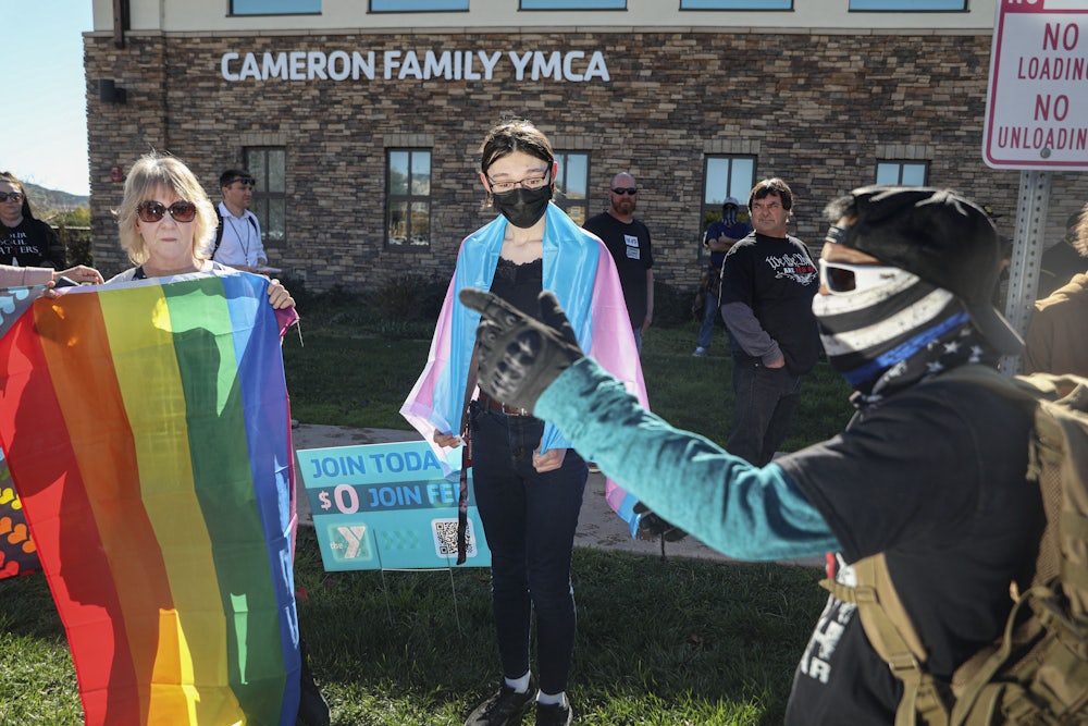 LGBTQ rights activists face off against anti-trans protesters