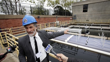 Algae at the wastewater biofuel system at the San Francisco Public Utilities Commission's Southeast Water Pollution Control Plant (shown here in 2012) capture carbon dioxide and produce biofuel.