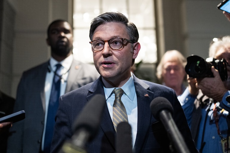 Mike Johnson speaks to reporters