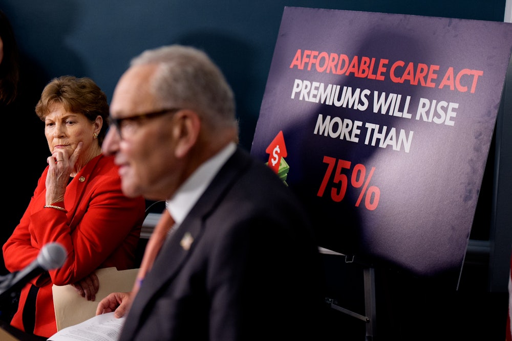 Democratic Senators Chuck Schumer and Jeanne Shaheen at a news conference