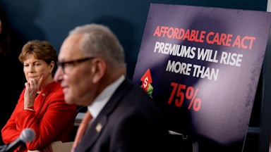 Democratic Senators Chuck Schumer and Jeanne Shaheen at a news conference