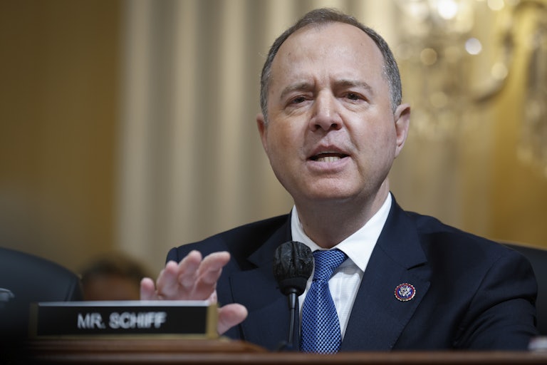 Representative Adam Schiff speaking during a congressional hearing. His nameplate is before him.