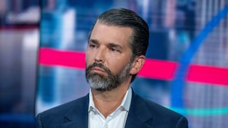 Donald Trump Jr. sits on a television set