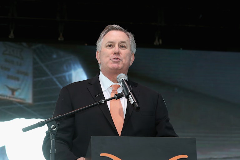 CEO Tim Leiweke speaks at a podium